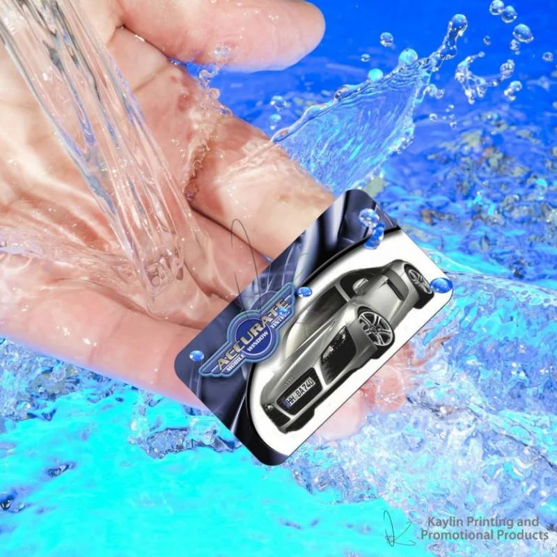 Waterproof plastic business card under running water