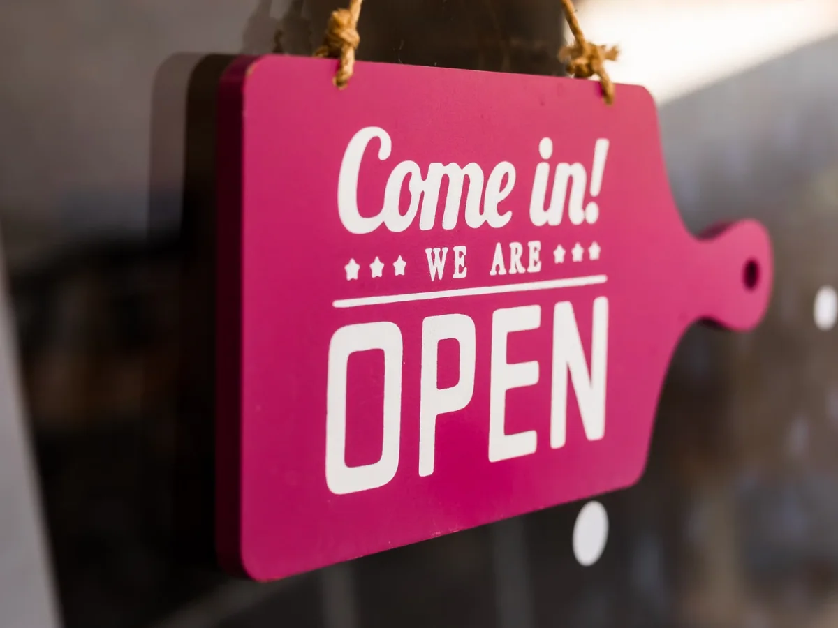 Printed open sign on a shop window